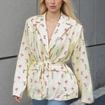 Oversized belted blazer with puff sleeves ¨C Modern and sophisticated elegance