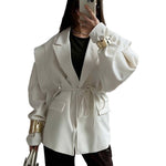 Oversized belted blazer with puff sleeves ¨C Modern and sophisticated elegance