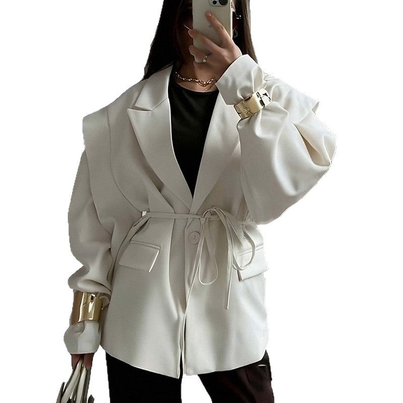 Oversized belted blazer with puff sleeves ¨C Modern and sophisticated elegance