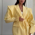 Oversized belted blazer with puff sleeves ¨C Modern and sophisticated elegance