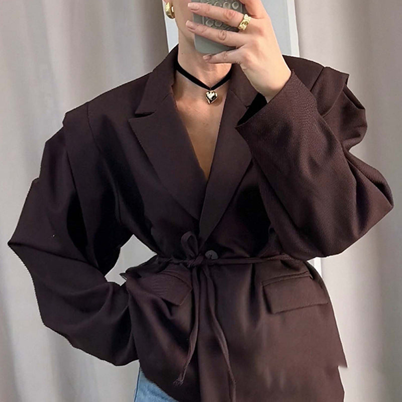 Oversized belted blazer with puff sleeves ¨C Modern and sophisticated elegance