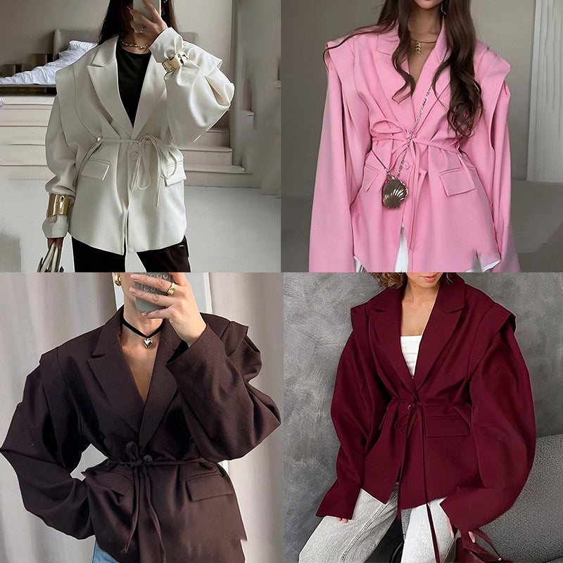 Oversized belted blazer with puff sleeves ¨C Modern and sophisticated elegance