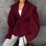 Oversized belted blazer with puff sleeves ¨C Modern and sophisticated elegance