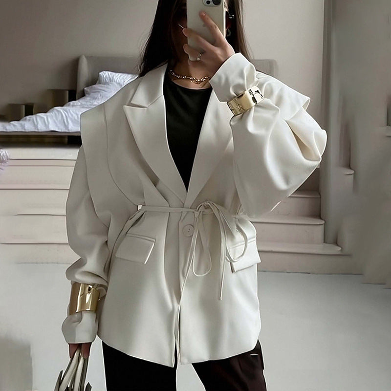 Oversized belted blazer with puff sleeves ¨C Modern and sophisticated elegance